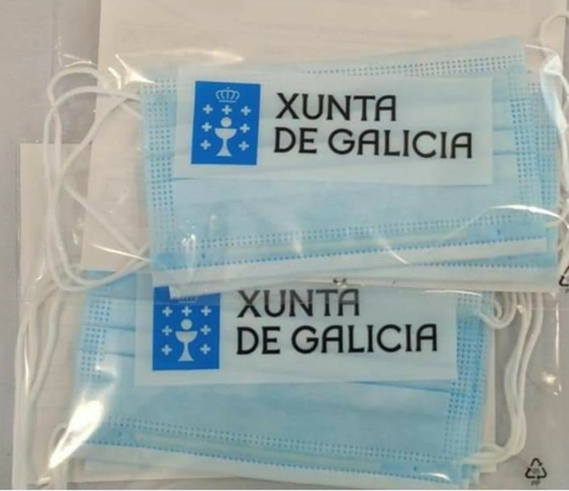 Mascarillas con el logo de la Xunta repartidas gratis en algunas farmacias a ciertos colectivos