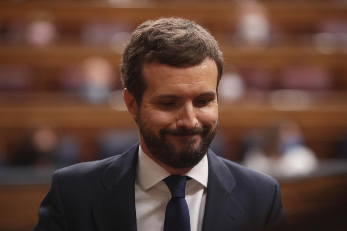 El presidente del PP, Pablo Casado, tras su intervención durante la segunda sesión del pleno en el que se debate la moción de censura planteada por Vox.