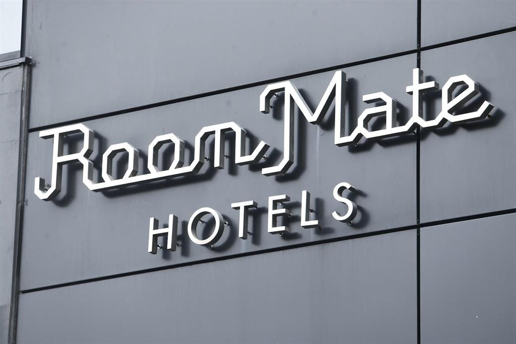 Logotipo de Room Mate sociedad participada por Sandra Ortega y en la que ha pedido una importante cantidad de dinero