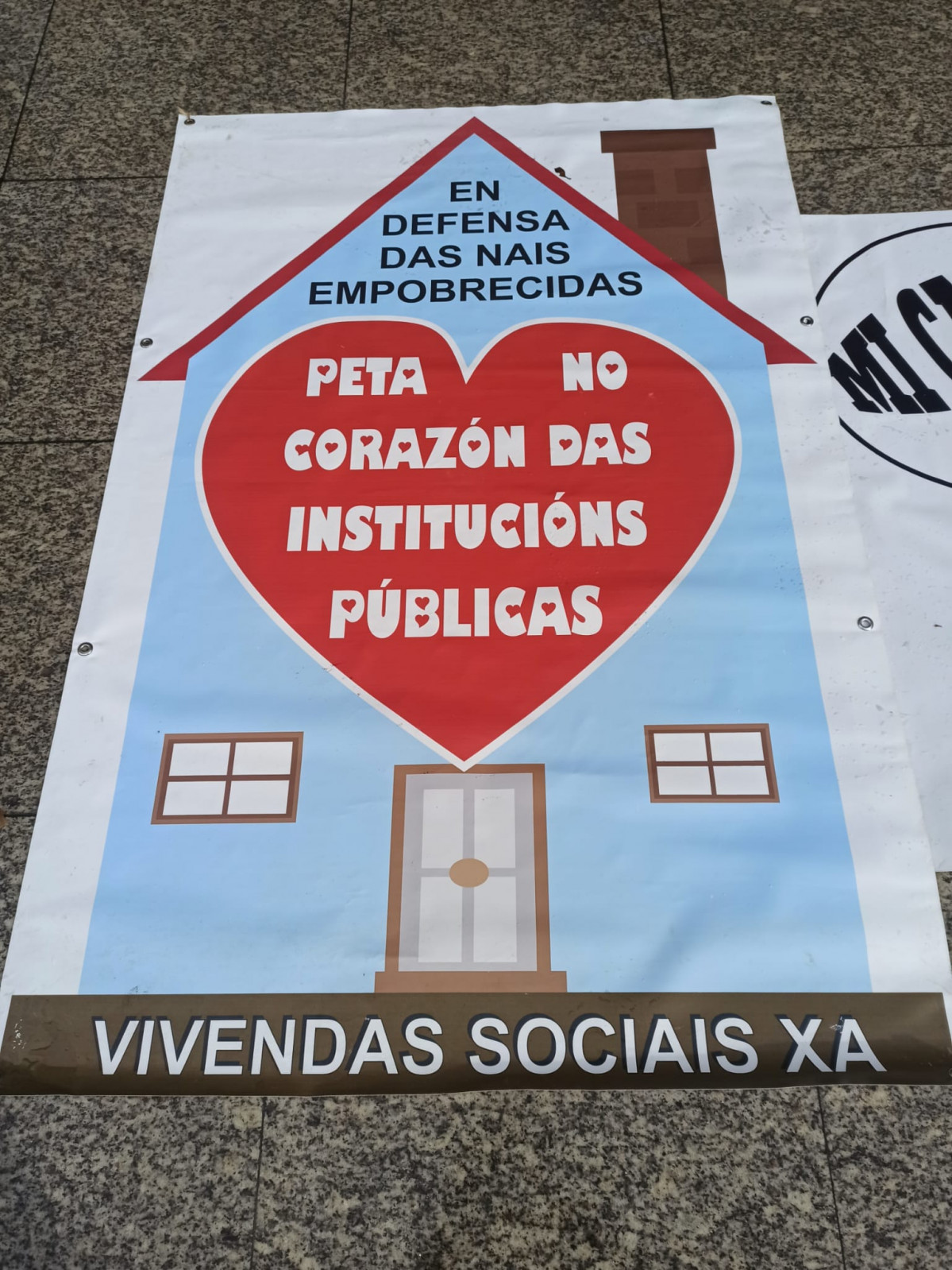 Cartel en la manifestaciu00f3n de Os Ninguu00e9ns