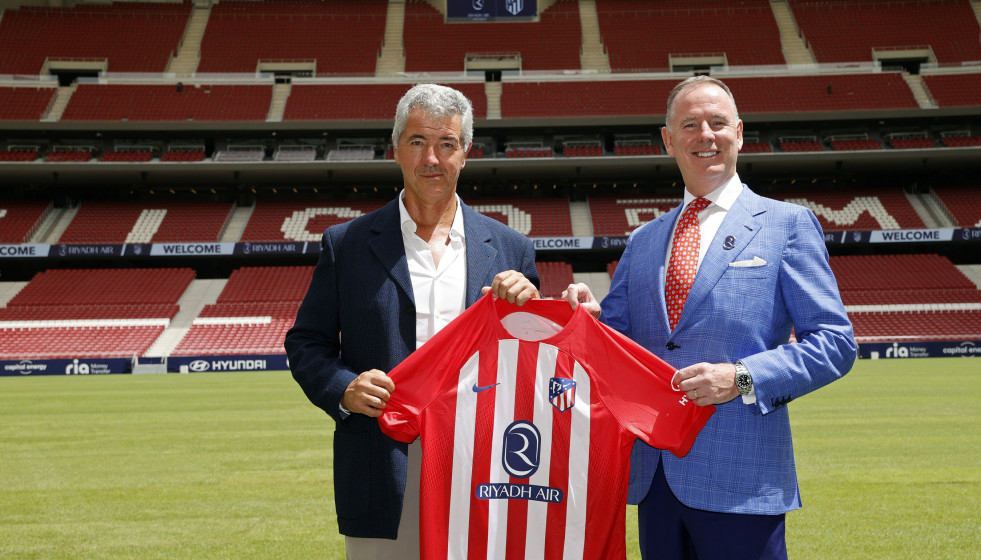 Tony Douglas, CEO of Riyadh Air, and Miguel Ángel Gil, CEO of Atlético de Madrid, display the new team kit.