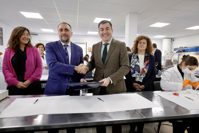 Los conselleiros Julio García Comesaña y Román Rodríguez