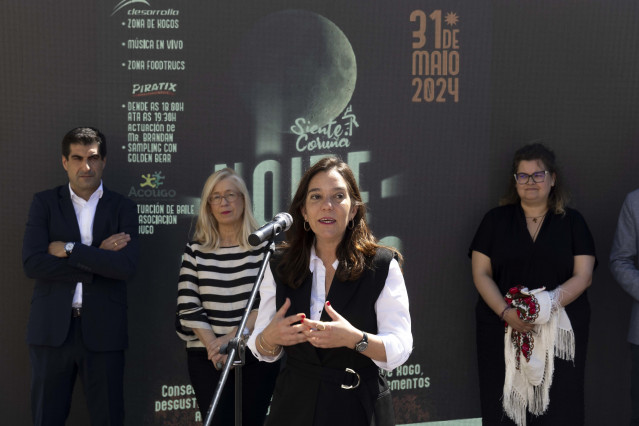 Presentación de la 'noche blanca'  en comercios de A Coruña