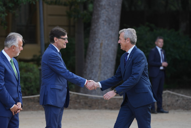 Illa y Rueda se saludan.