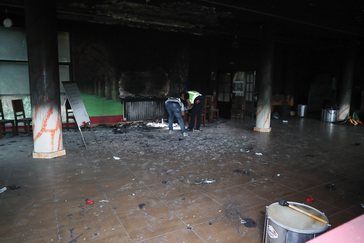 Agentes de la Policía Nacional trabajan en la investigación en el edificio que albergará el centro de la Xunta para menores migrantes, a 20 de septiembre de 2025, en Monforte de Lemos, Lugo