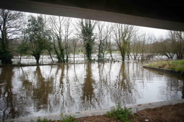 Archivo - Desbordamiento del río Miño, a 28 de enero de 2025, en Lugo, Galicia (España). La borrasca Herminia ha provocado numerosos destrozos en Galicia y aunque la situación empieza a mejorar, e
